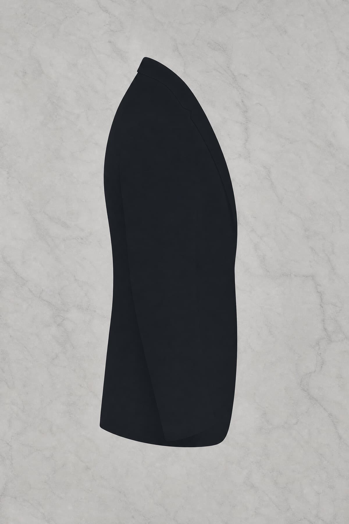 Side silhouette of a tailored jacket showing the shoulder line and sleevehead