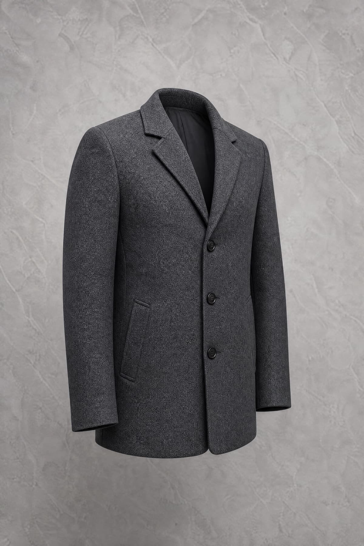 Coat Short, slate-grey wool ending at the hip, single breasted, on an invisible form