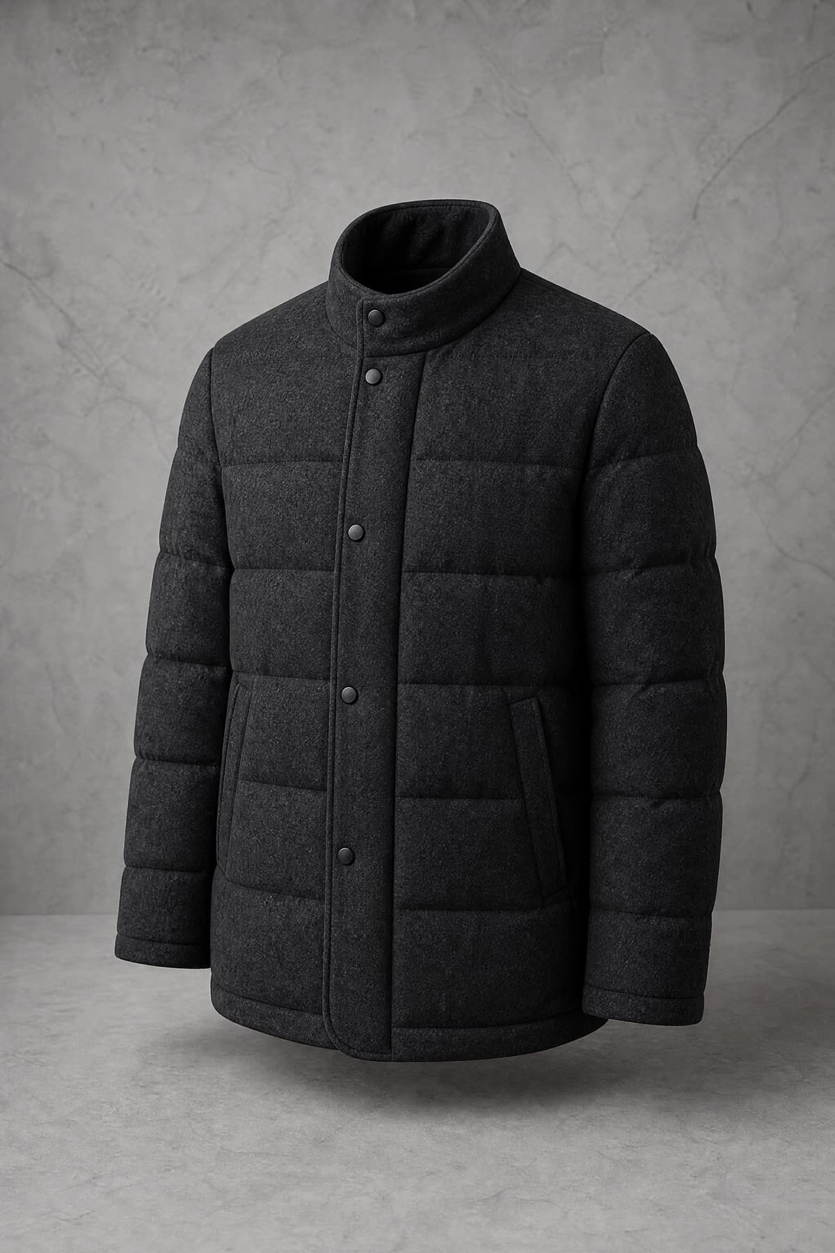 Padded Wool Blend, charcoal woven wool face quilted in wide channels, on an invisible form